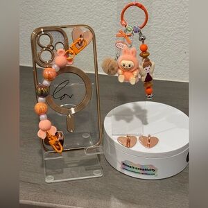 Orange keychains with charming designs